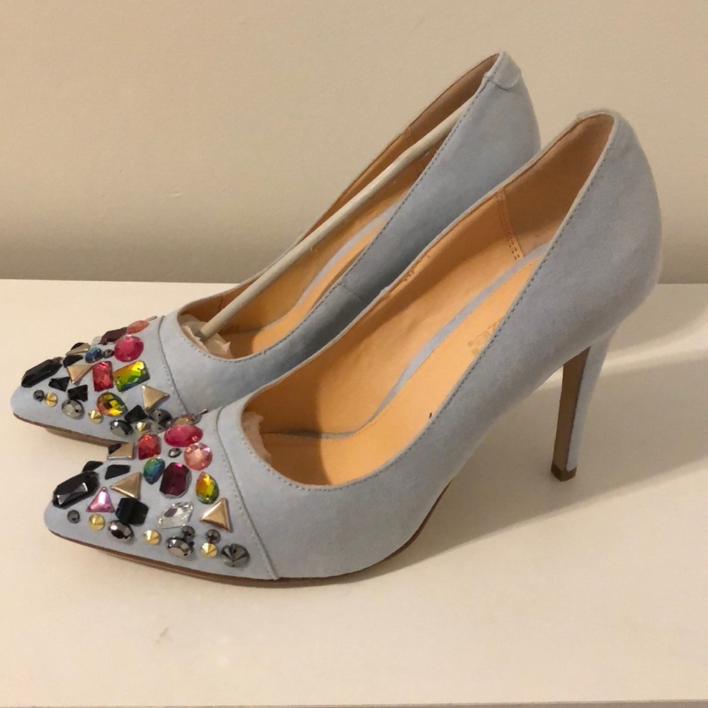 Blue jeweled toe pumps